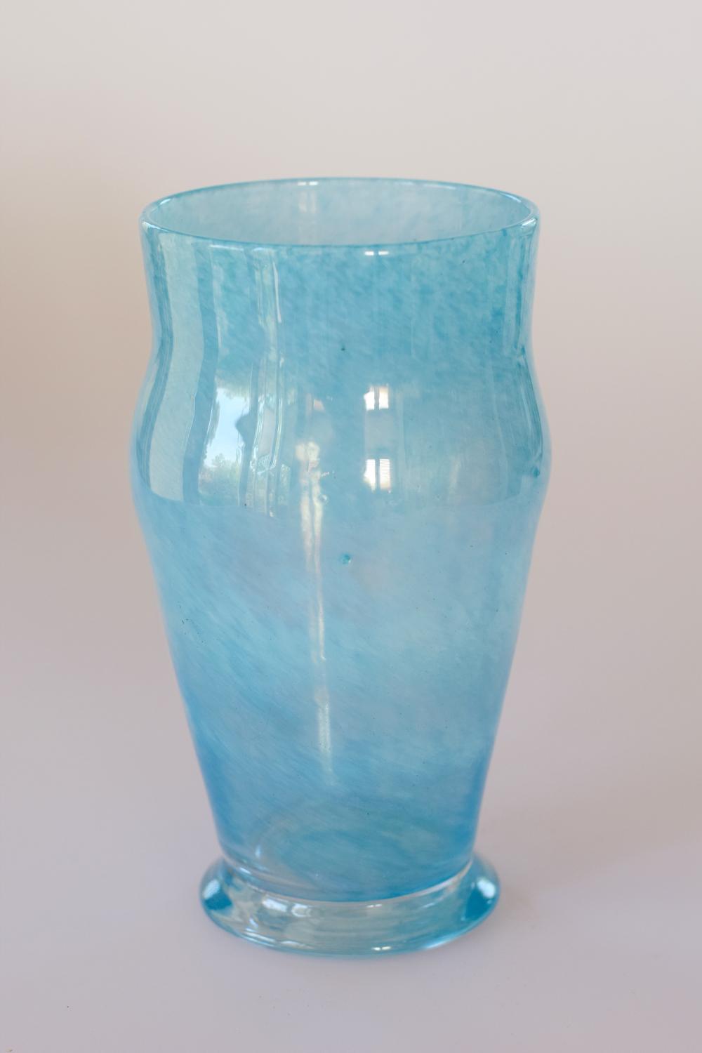 Small pale blue cloudy vase.