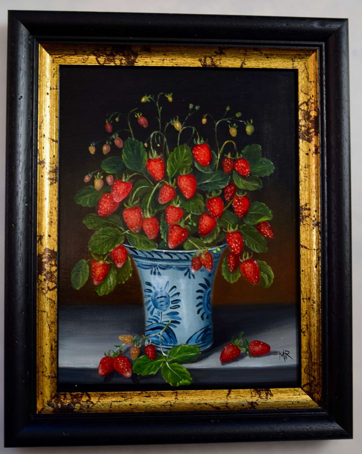 Vase of wild strawberries