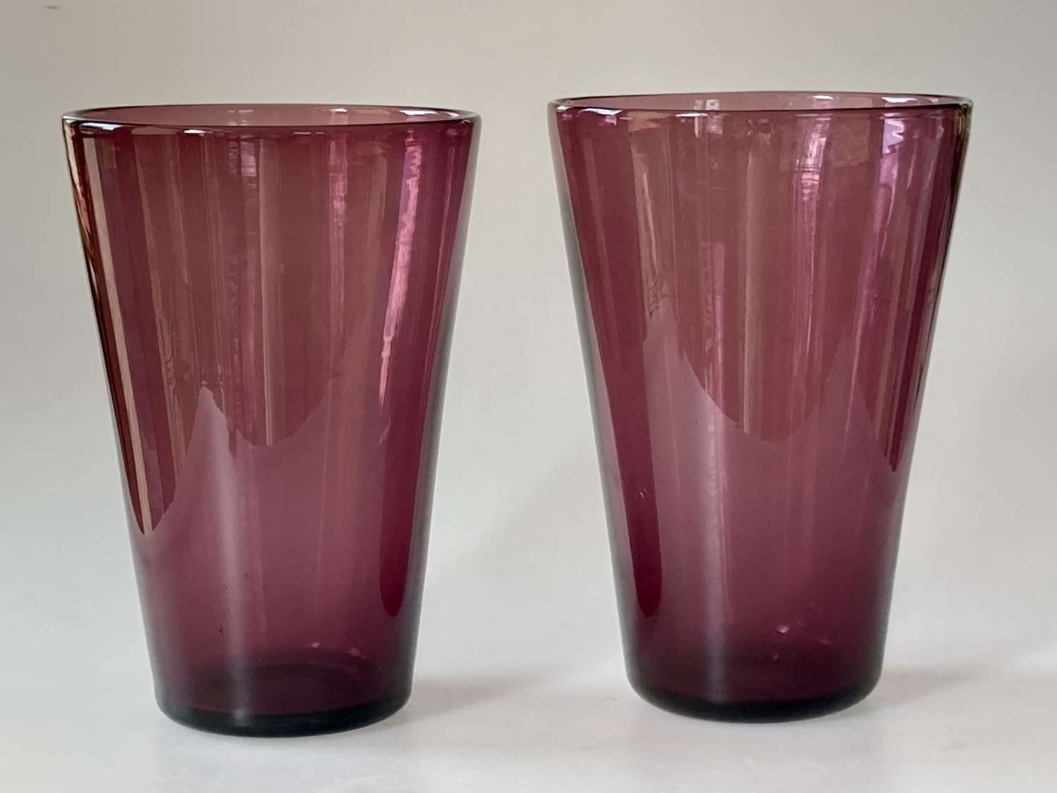 Pair of amethyst glass tumbler vases