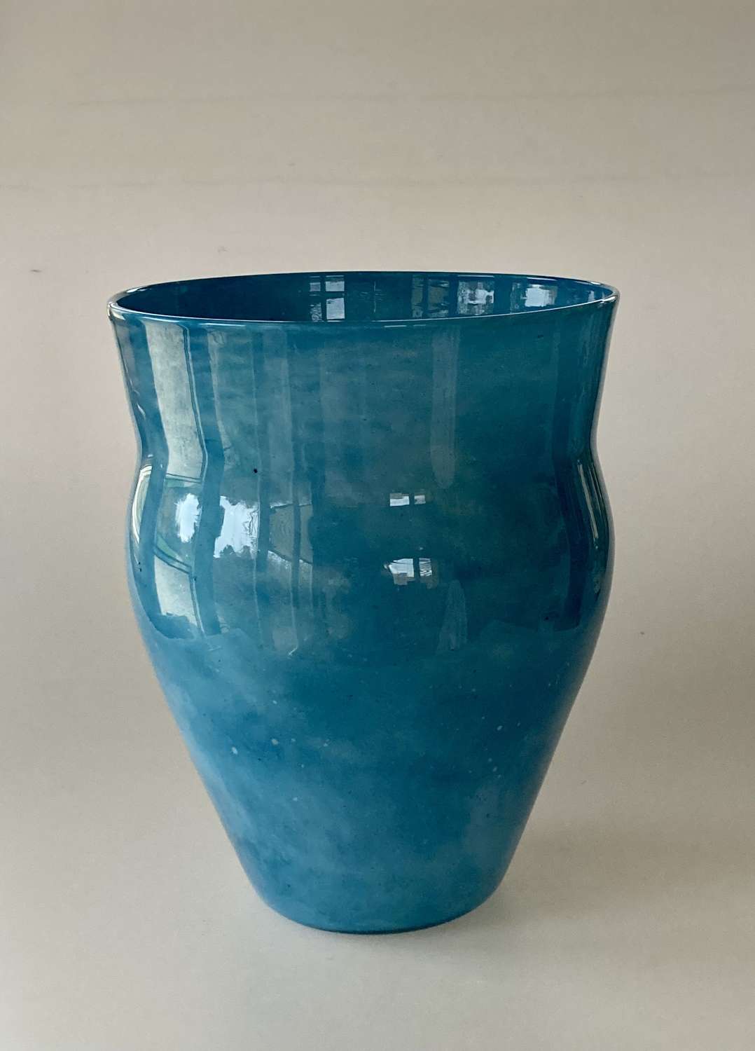 Pale blue cloudy Bronze Age vase