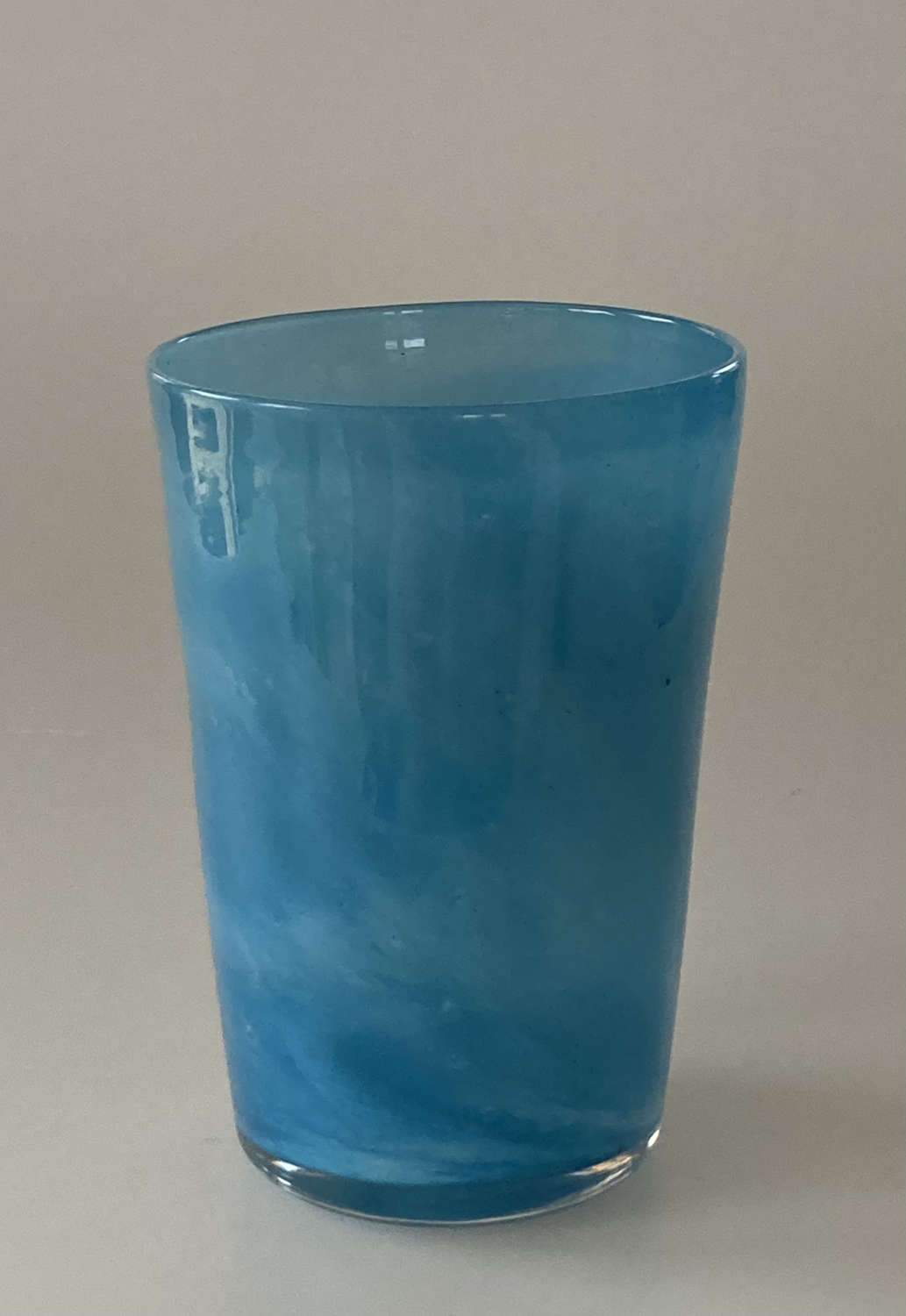 Small blue tumbler vase