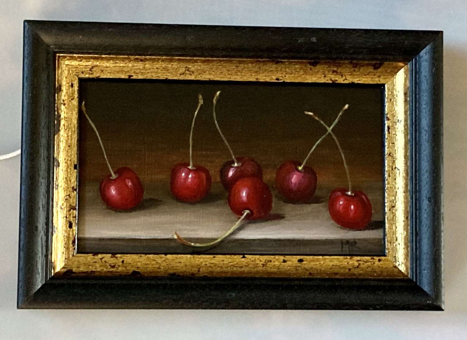 Cherries on a table.
