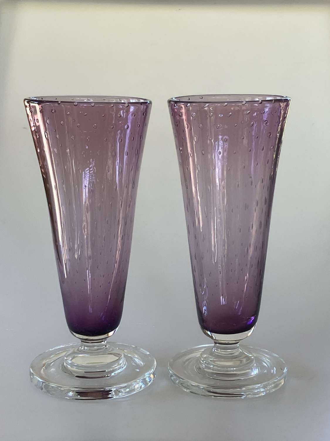 Pair of amethyst conicle vases, Keith Murray