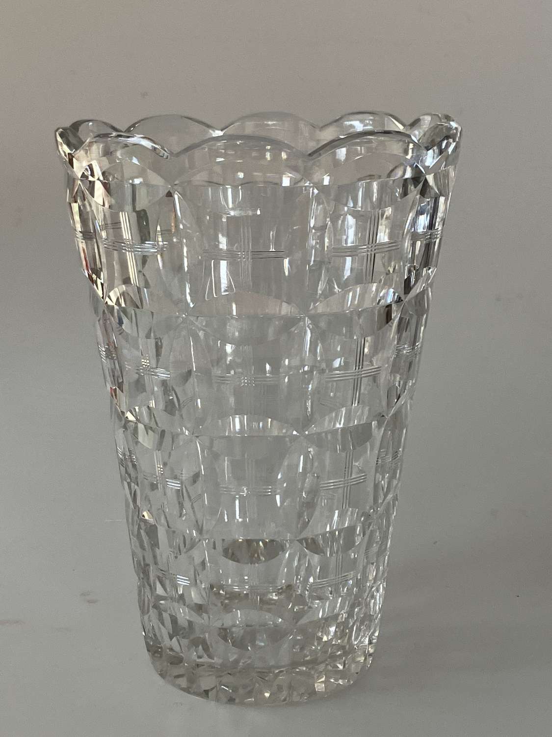 Cut glass vase with wavy top