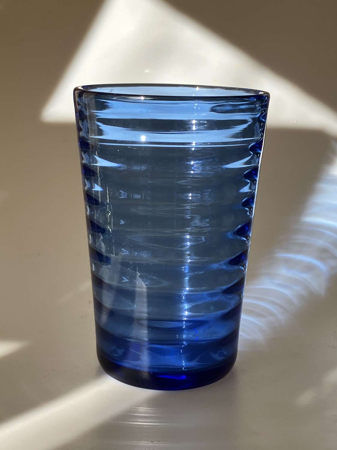 Blue ribbed bucket vase