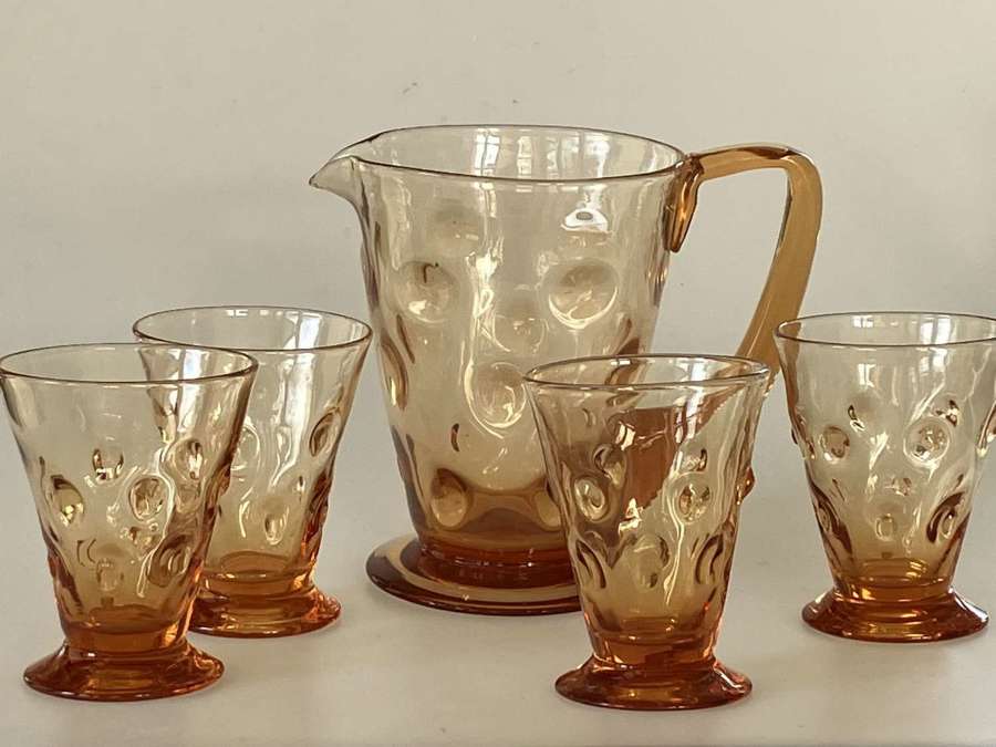 Set 4 amber Bulls Eye glasses and jug