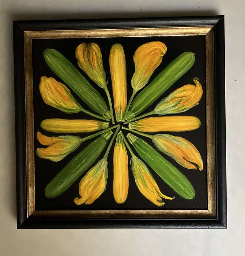Courgettes and flowers in a circle.