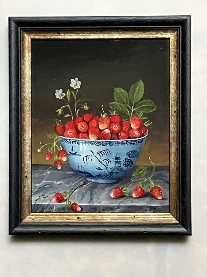 Wild strawberries and their flowers.