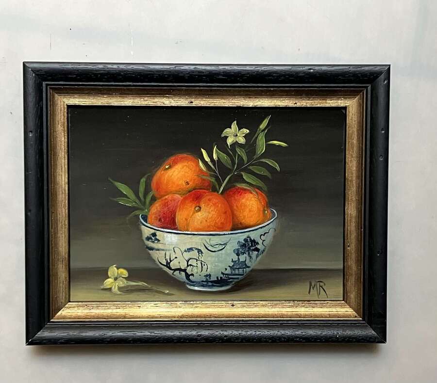 4 apricots in a bowl
