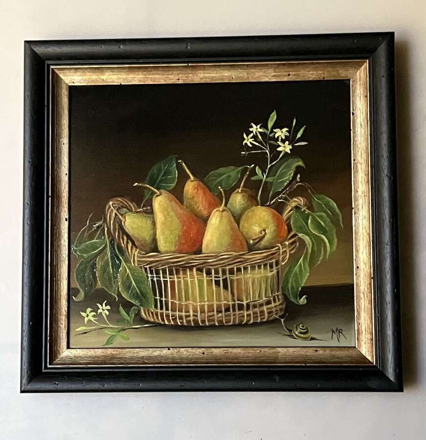Pears in a basket with sprigs of jasmine